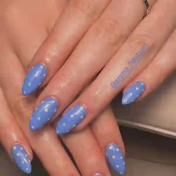 Glossy orange almond gel nails