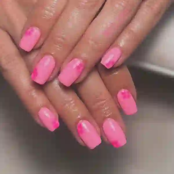 Soft pink gel nails with subtle art